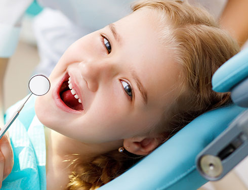 Girl in dental chair - Pediatric Dentist in Rio Rancho, NM