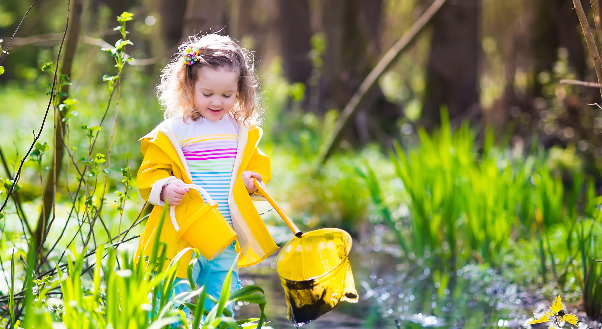 Girl playing in swamp - Pediatric Dentist in Albuquerque, NM