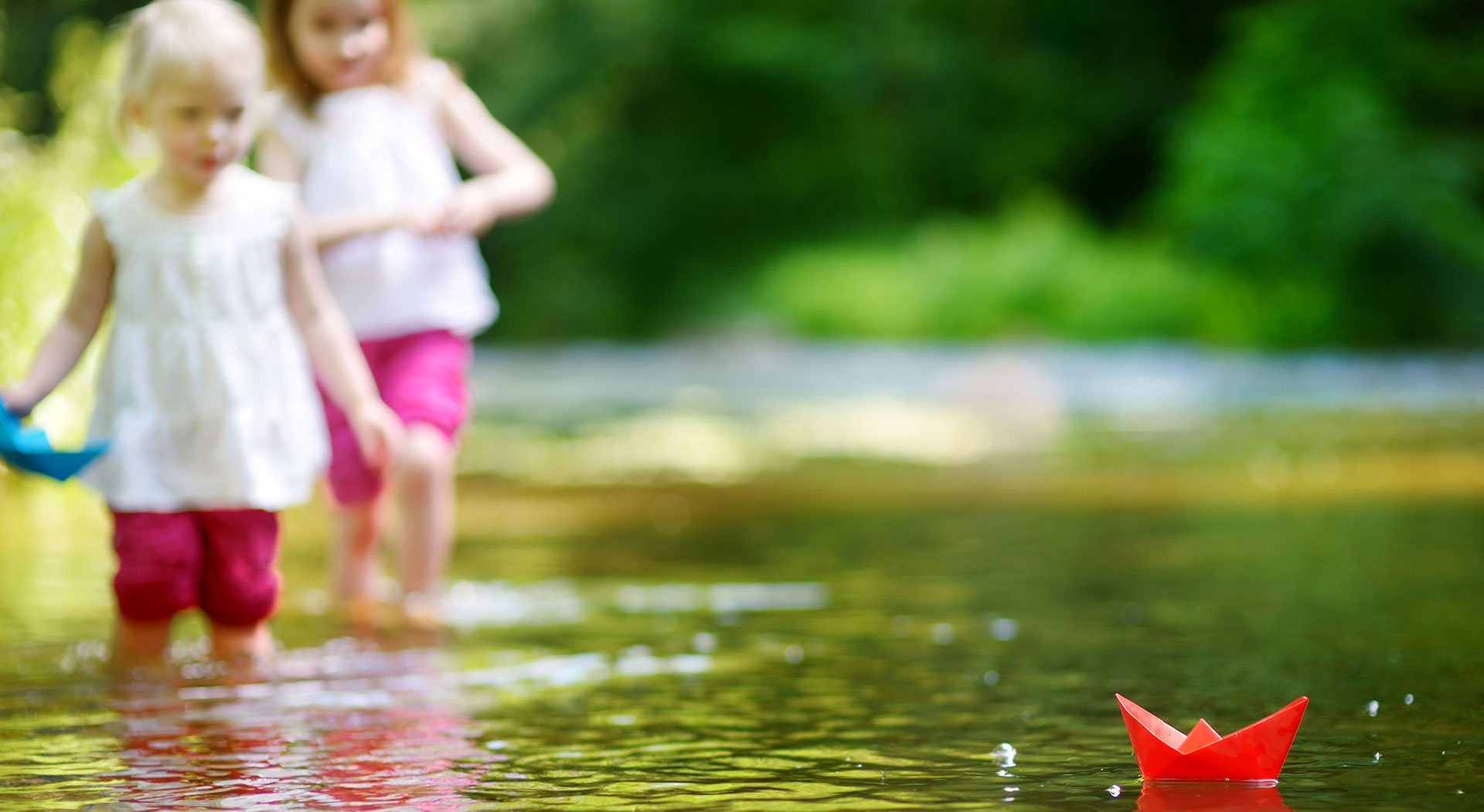 Girls playing in lake - Pediatric Dentist in Albuquerque, NM